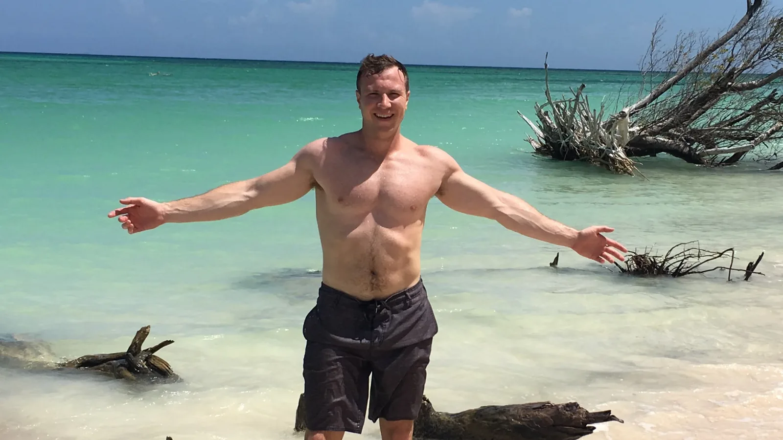 Patrick on a tropical beach